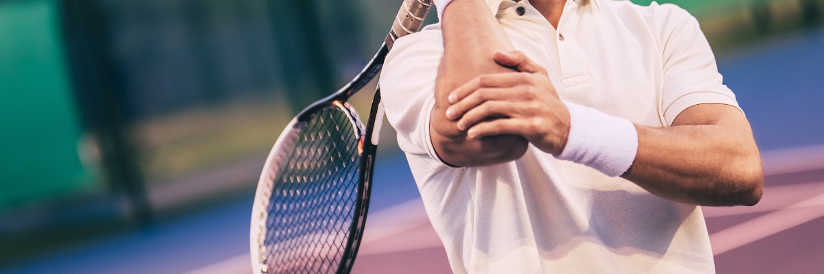 Gomito del tennista: dai sintomi alla cura