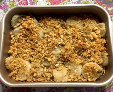 Daikon gratinato con crumble di frutta secca