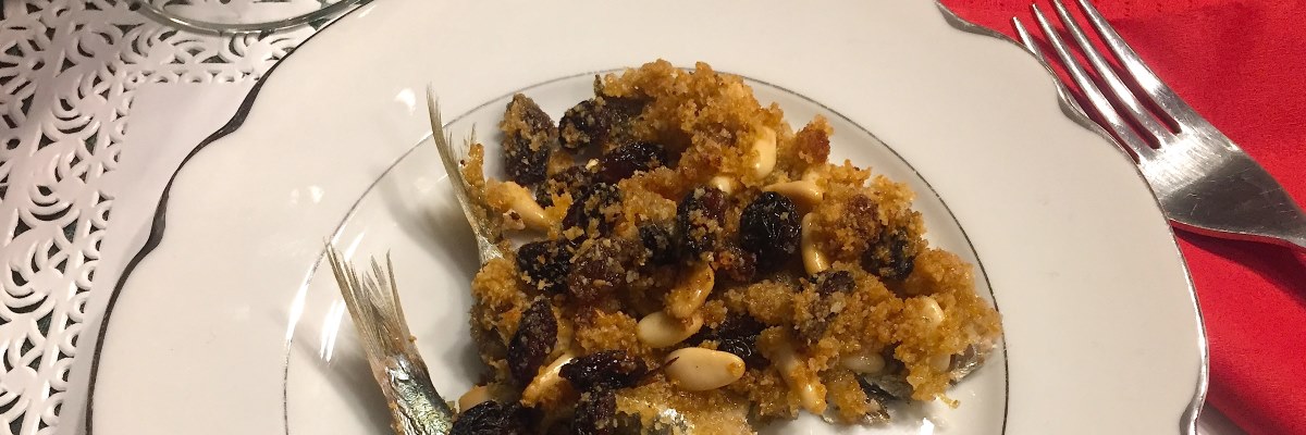 Sarde in teglia con pinoli e uvetta